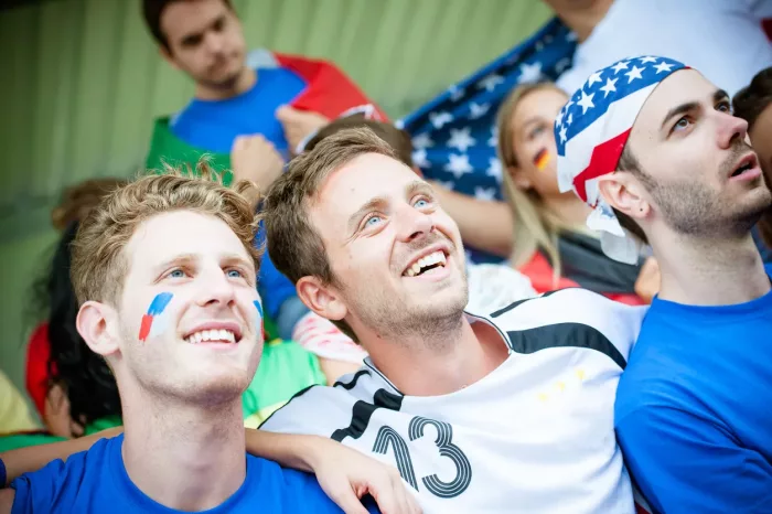 Fans of different nations at the stadium together